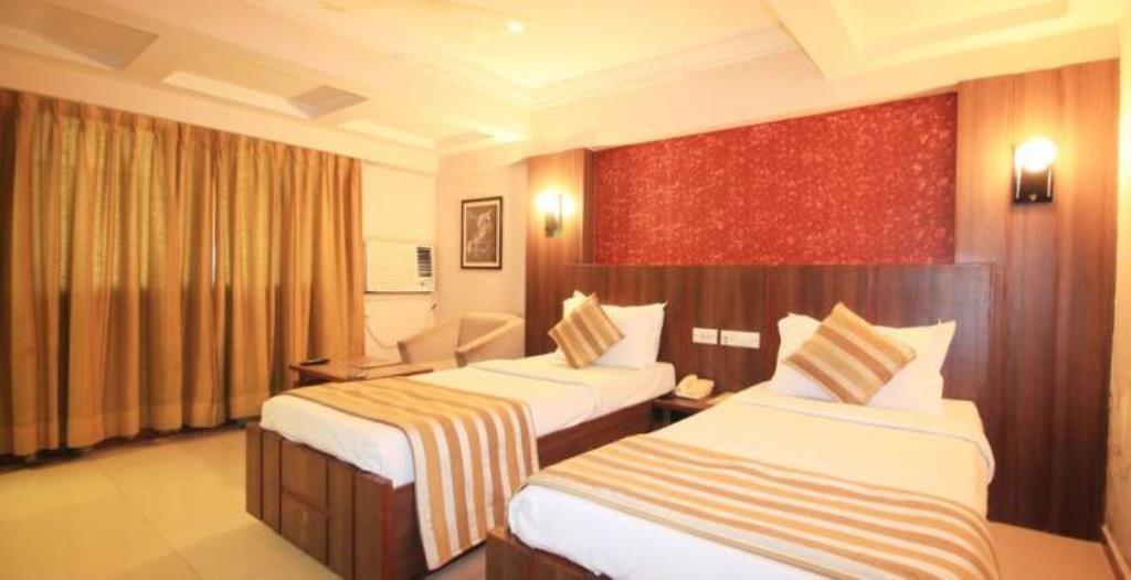 Hotel Eden Ahmedabad Quarto foto